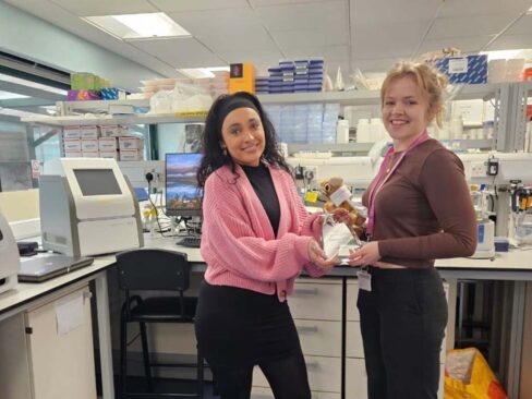Izzy Hughes being presented with her PCRBIO Grant Winner Award by Holly Ross (Account Manager)