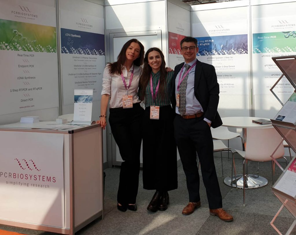 Photo of the PCRBIO Team on the booth at ECCMID 2019